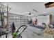 Organized garage with overhead storage and ample space for vehicles at 2381 Appaloosa Cir, Sarasota, FL 34240