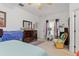 The spacious bedroom features neutral walls, carpet flooring, and plenty of natural light at 25324 Alicante Dr, Punta Gorda, FL 33955
