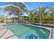 Inviting screened-in pool with clear water and surrounding patio, perfect for enjoying sunny days at 25324 Alicante Dr, Punta Gorda, FL 33955