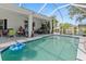 Inviting screened-in pool with lounge chairs, comfortable patio seating, and outdoor living at 25324 Alicante Dr, Punta Gorda, FL 33955