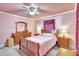 Relaxing bedroom offers comfortable bed, bedside tables, and dresser at 2622 11Th W Ave, Bradenton, FL 34205