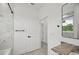 Contemporary bathroom showcasing marble counters, modern fixtures, with shower and bath at 2794 Escambia Cir, North Port, FL 34288