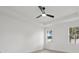 Bright bedroom with two windows and neutral color palette at 2794 Escambia Cir, North Port, FL 34288