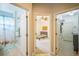Hallway view showing bathroom, bedroom and laundry room at 3041 Stonegate Falls Dr, Land O Lakes, FL 34638