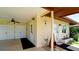 Welcoming carport featuring a ceiling fan, double closet storage, and an inviting front entrance at 3305 Notre Dame Pl # 3305, Bradenton, FL 34207