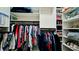 Organized walk-in closet with ample shelving and hanging space, maximizing storage solutions at 3305 Notre Dame Pl # 3305, Bradenton, FL 34207