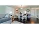 Inviting living and dining area with dark wood floors and ample natural light at 3305 Notre Dame Pl # 3305, Bradenton, FL 34207