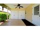 Covered patio featuring convenient storage closets, perfect for outdoor living and organization at 3305 Notre Dame Pl # 3305, Bradenton, FL 34207