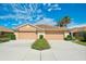Well-maintained home with two-car garage, tiled roof, and manicured landscaping at 362 Fairway Isles Ln, Bradenton, FL 34212