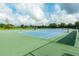 Well-maintained community tennis courts for residents to enjoy a game of tennis at 362 Fairway Isles Ln, Bradenton, FL 34212