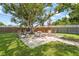 Relaxing backyard including lounge chairs at 409 Archibald Ave, Sarasota, FL 34243