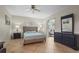 Spacious bedroom with tile floors, neutral walls, and slider doors to the sun room at 409 Archibald Ave, Sarasota, FL 34243