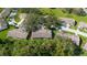 Aerial view of homes with lush greenery at 4279 Oakhurst E Cir # 3044, Sarasota, FL 34233