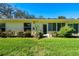 Inviting backyard featuring lush greenery and well-maintained landscaping at 4279 Oakhurst E Cir # 3044, Sarasota, FL 34233
