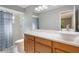 Clean bathroom featuring double sinks, a shower, and modern fixtures at 4279 Oakhurst E Cir # 3044, Sarasota, FL 34233