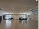 Large common room with tables, chairs, and tile flooring at 4279 Oakhurst E Cir # 3044, Sarasota, FL 34233
