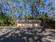 Ample unit parking is provided under the shade of mature oak trees at 4279 Oakhurst E Cir # 3044, Sarasota, FL 34233