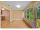 Cozy sunroom with floor to ceiling windows and hardwood floors at 4279 Oakhurst E Cir # 3044, Sarasota, FL 34233
