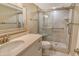 Bathroom features a vanity with a sink, a toilet, and a glass-enclosed shower at 4325 Gulf Of Mexico Dr # 204, Longboat Key, FL 34228