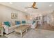 Comfortable living room featuring cozy seating, a rustic coffee table, and an inviting open floor plan at 4325 Gulf Of Mexico Dr # 204, Longboat Key, FL 34228