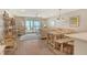 Inviting living room with beach view, dining table, and comfortable furnishings at 4325 Gulf Of Mexico Dr # 204, Longboat Key, FL 34228