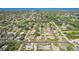 Aerial view of a residential neighborhood near the coast, featuring lush vegetation at 4330 Alligator Dr, Venice, FL 34293