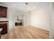 Open dining area with hardwood floors, next to the kitchen with lots of natural light at 520 27Th W St, Bradenton, FL 34205
