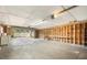 Spacious garage featuring ample storage space with built in shelving and room for multiple vehicles or projects at 520 27Th W St, Bradenton, FL 34205