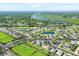 Aerial view showcasing a community with ponds, green spaces, and neatly arranged homes at 5333 Tide Point Way, Bradenton, FL 34208