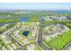 Panoramic aerial perspective of a neighborhood featuring lakes, green belts, and diverse housing at 5333 Tide Point Way, Bradenton, FL 34208
