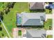 Aerial view of a beautiful property with a screened-in pool and well-maintained landscaping at 5333 Tide Point Way, Bradenton, FL 34208
