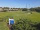 Community dog park features green space and enclosed area for pets to safely enjoy outdoors at 5333 Tide Point Way, Bradenton, FL 34208