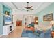 Bright and open living space with tile flooring, comfortable seating, and modern ceiling fan at 5333 Tide Point Way, Bradenton, FL 34208