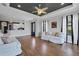 Bright and airy living room with hardwood floors, modern decor, and an open-concept layout at 5863 Cavano Dr, Sarasota, FL 34231