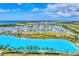 Expansive blue lagoon surrounded by neatly arranged homes in a Primary-planned community at 6028 Red Mangrove Ln, Bradenton, FL 34210