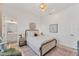 A calm bedroom boasts a cozy bed, stylish decor, and a tranquil ambiance at 6028 Red Mangrove Ln, Bradenton, FL 34210