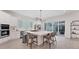 Spacious kitchen with a large island, barstool seating and stainless steel appliances at 6028 Red Mangrove Ln, Bradenton, FL 34210