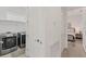 The laundry room showcases a washer and dryer, convenient for laundry tasks at 6028 Red Mangrove Ln, Bradenton, FL 34210