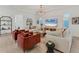 Well-lit living room with stylish furniture and decor, perfect for entertaining guests at 6028 Red Mangrove Ln, Bradenton, FL 34210