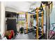 Home gym with workout equipment and a ceiling fan at 6178 Coliseum Blvd, Port Charlotte, FL 33981