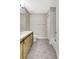 Bathroom showcasing rustic vanity and stylish fixtures at 6352 Robin Cv, Lakewood Ranch, FL 34202