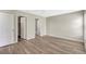 Spacious bedroom showcasing updated flooring and neutral paint at 6352 Robin Cv, Lakewood Ranch, FL 34202