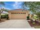 Lovely single-Gathering home featuring a two-car garage, well-manicured lawn, and tidy landscaping at 6352 Robin Cv, Lakewood Ranch, FL 34202