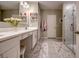 Bathroom featuring double sinks and glass door shower at 640 Encarnacion St, Punta Gorda, FL 33983