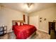 Serene bedroom with carpet floors, closet, and a warm, inviting ambiance at 640 Encarnacion St, Punta Gorda, FL 33983