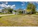Well-maintained single-story home with a manicured lawn and a two car garage at 640 Encarnacion St, Punta Gorda, FL 33983