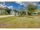 Well-maintained single-story home with a manicured lawn and a two car garage at 640 Encarnacion St, Punta Gorda, FL 33983