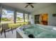Relaxing sunroom featuring a luxurious hot tub, perfect for unwinding with a view of the outdoors at 640 Encarnacion St, Punta Gorda, FL 33983
