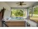 Inviting hot tub in a sunroom setting, complete with comfortable seating and scenic outdoor views at 640 Encarnacion St, Punta Gorda, FL 33983