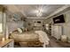 Comfortable main bedroom with tray ceiling, pendant lighting, and neutral decor at 640 Encarnacion St, Punta Gorda, FL 33983